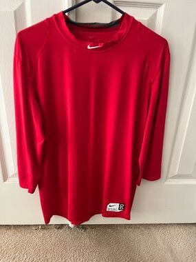Nike Red 3/4 Sleeve Athletic Top with White Swoosh
